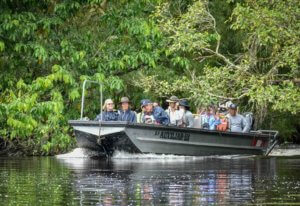 A Skiff loaded with cruise passengers