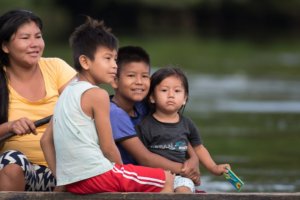 Family in boat on the river